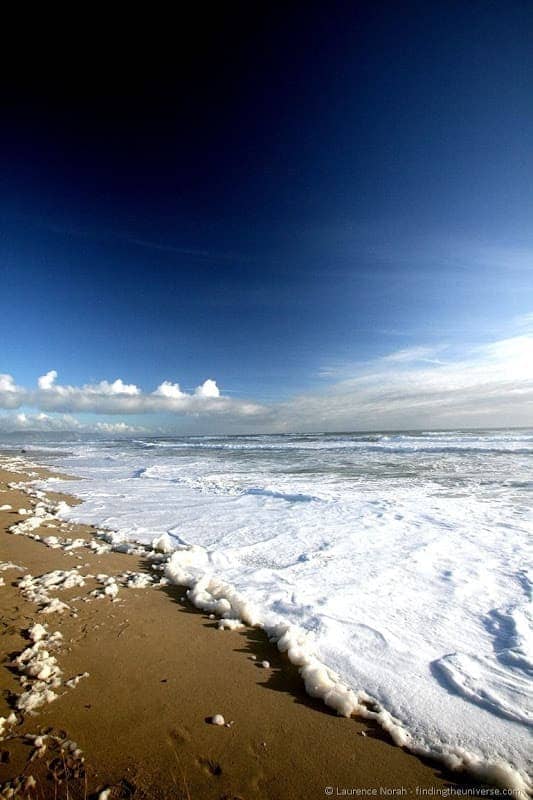 Foamy beach near Karamea Foamy beach near Karamea