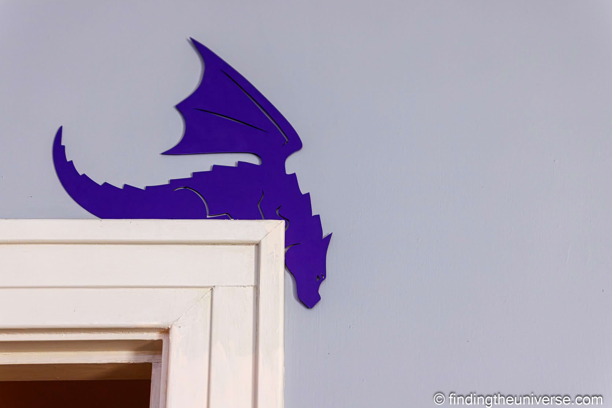 Metal dragon door topper by Laurence Norah